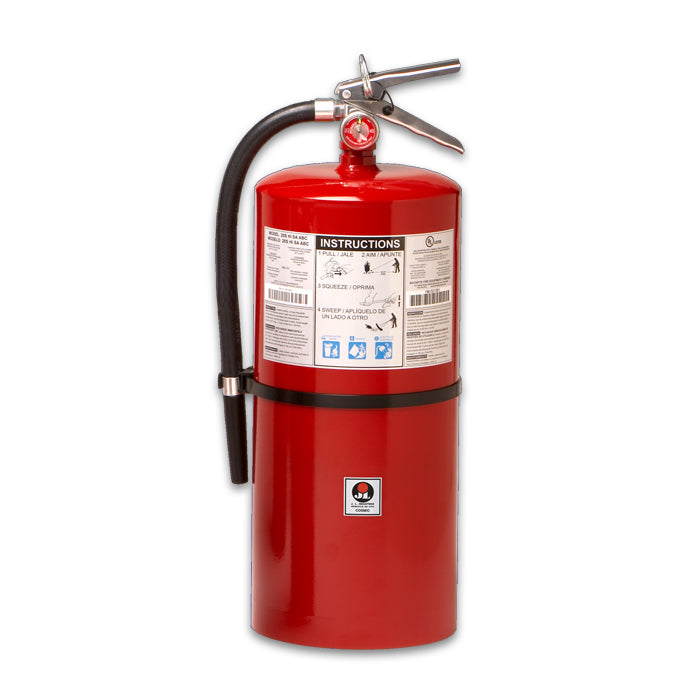 Red fire extinguisher with a label on a white background
