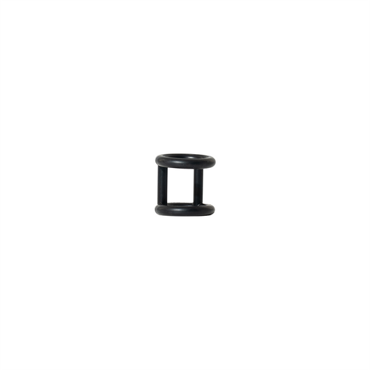 Black cylindrical object on a white background